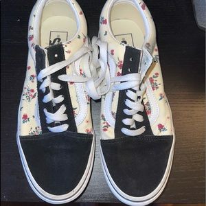 Black and cream colored flower vans